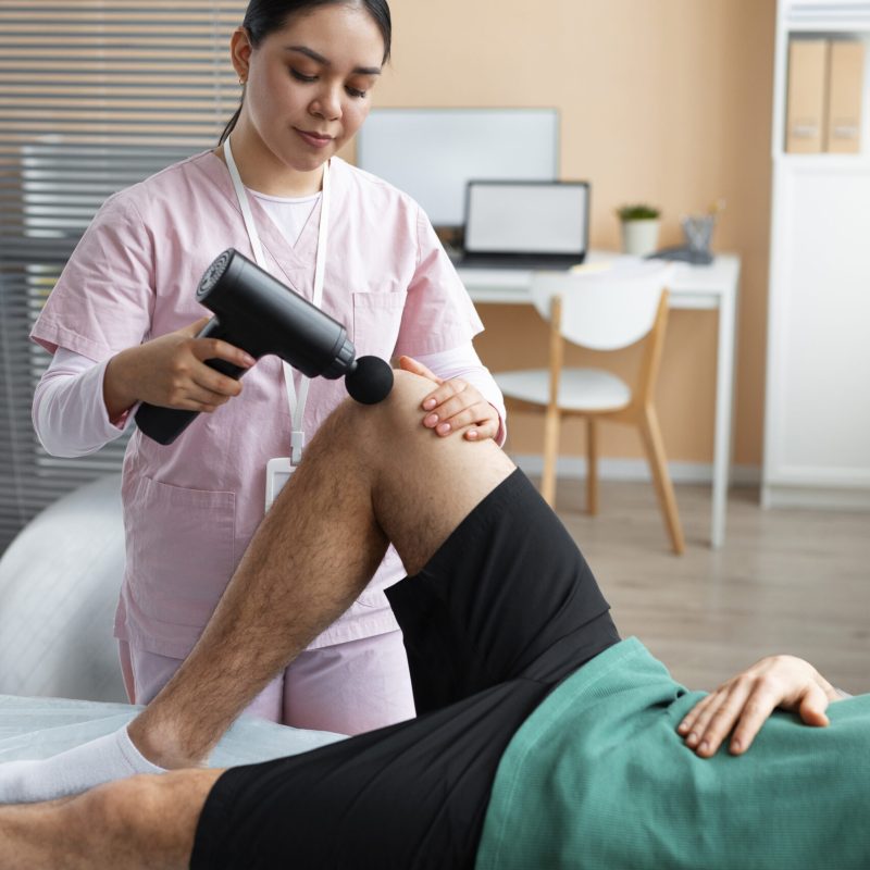 doctor-helping-patient-rehabilitation